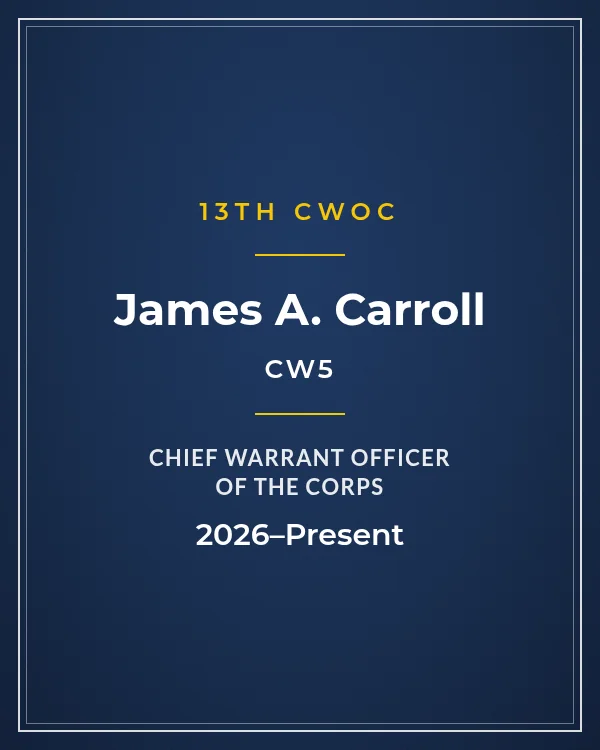 Nameplate card: CW5 James A. Carroll, 13th Chief Warrant Officer of the Corps, 2026–Present